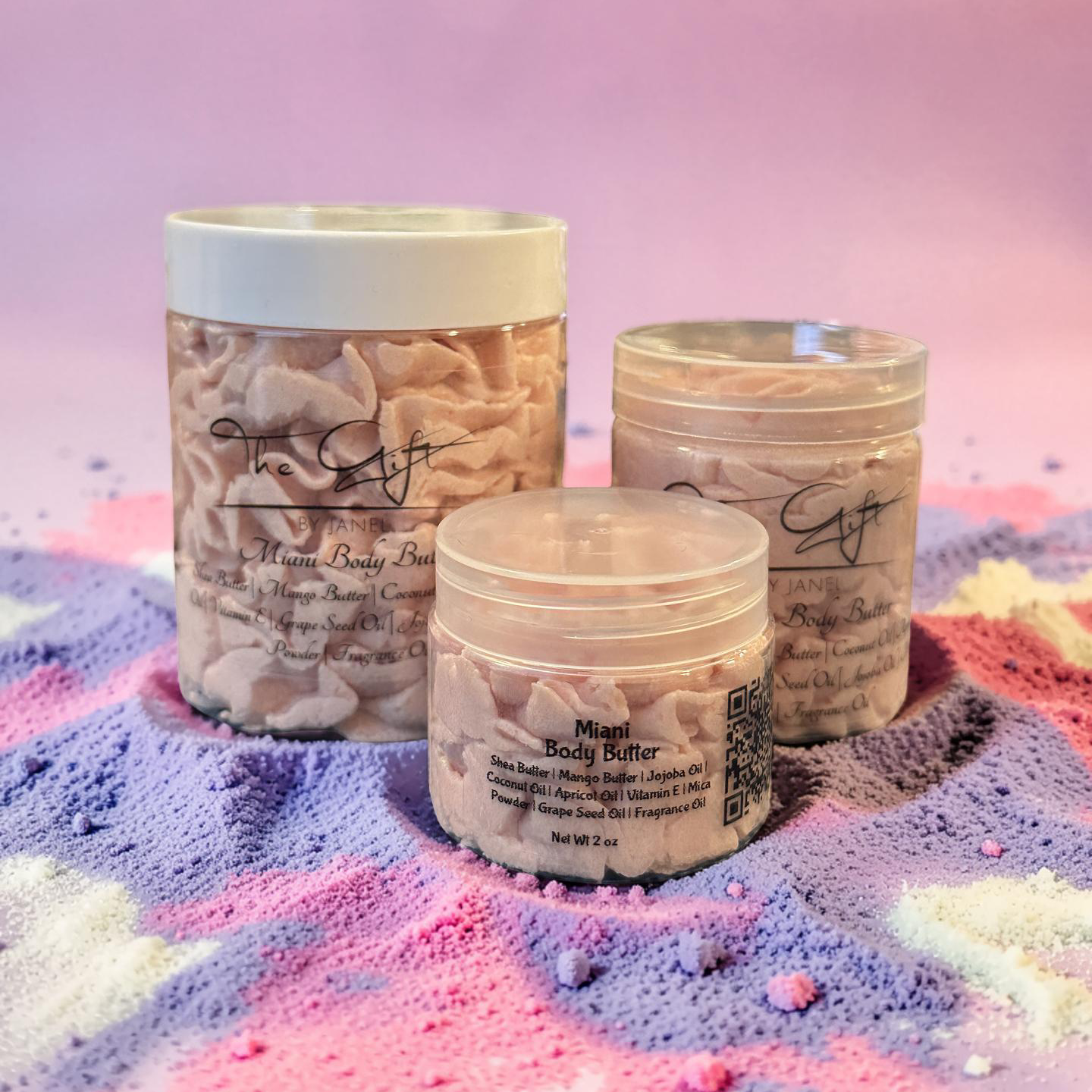 Three jars of body butter on a colorful, textured surface with a gradient background.
