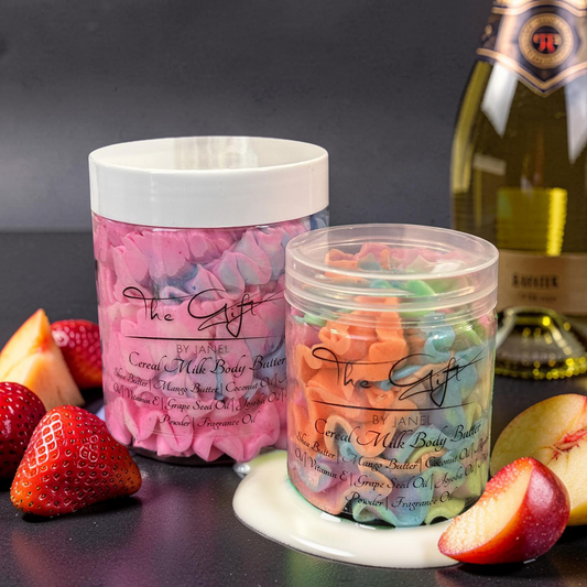 Two jars of candy with a bottle of champagne and fruits on a dark surface