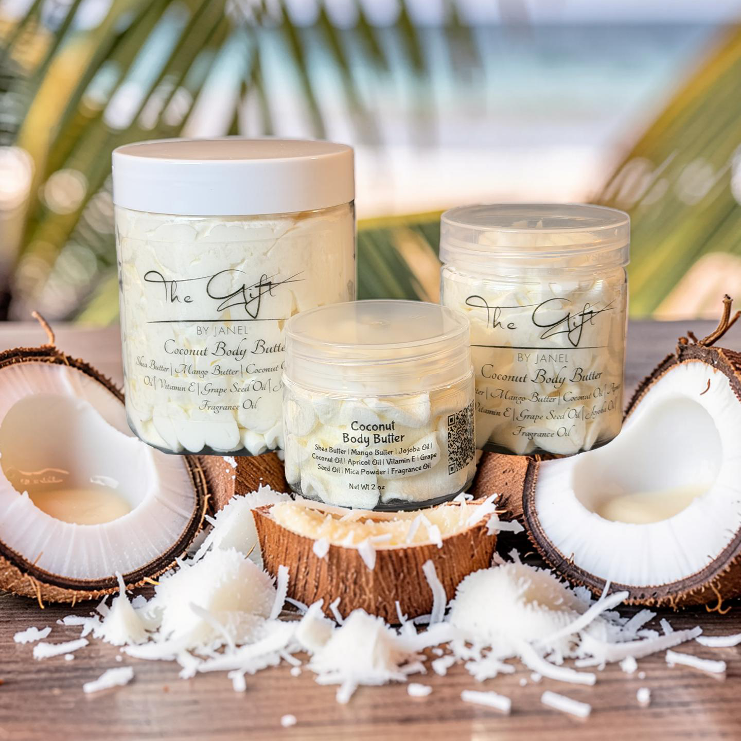 Coconut body butter jars with coconuts and shavings on a wooden surface with a blurred natural background.