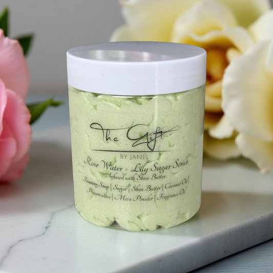 Jar of Rose Water + Lily Sugar Scrub with flowers in the background